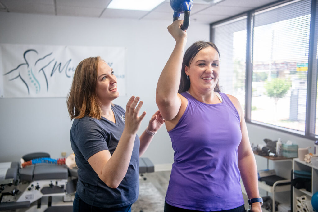 A picture of a patient doing shoulder rehab. 