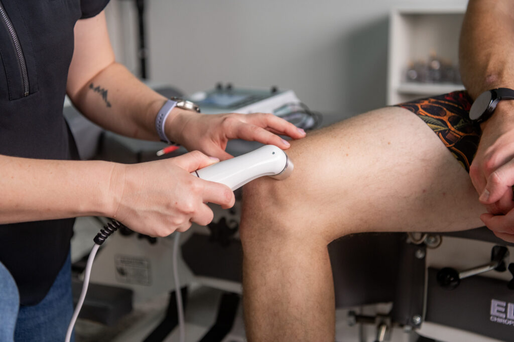 An image of ultrasound therapy on a knee